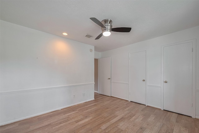 5711 Arenas Timbers Dr, Humble, TX 77346 - unfurnished bedroom featuring light wood-style floors, a ceiling fan, and recessed lighting