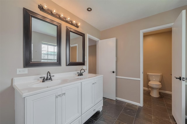 5711 Arenas Timbers Dr, Humble, TX 77346 - full bathroom featuring double vanity and toilet