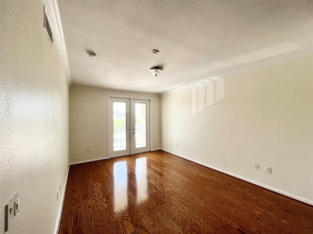 7575 Kirby Dr Unit 1203, Houston, TX 77030 - unfurnished room with ornamental molding, wood finished floors, and french doors