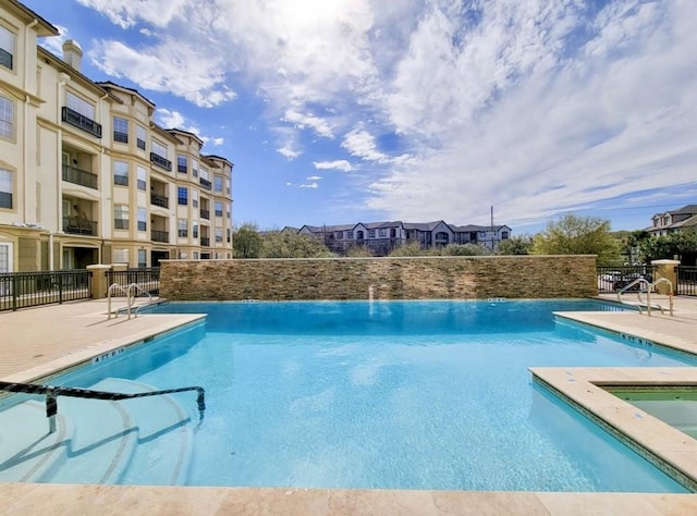 7575 Kirby Dr Unit 1203, Houston, TX 77030 - community pool featuring a patio