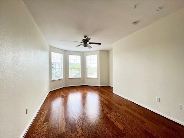 7575 Kirby Dr Unit 1203, Houston, TX 77030 - unfurnished room with a ceiling fan, wood finished floors, and a smoke detector
