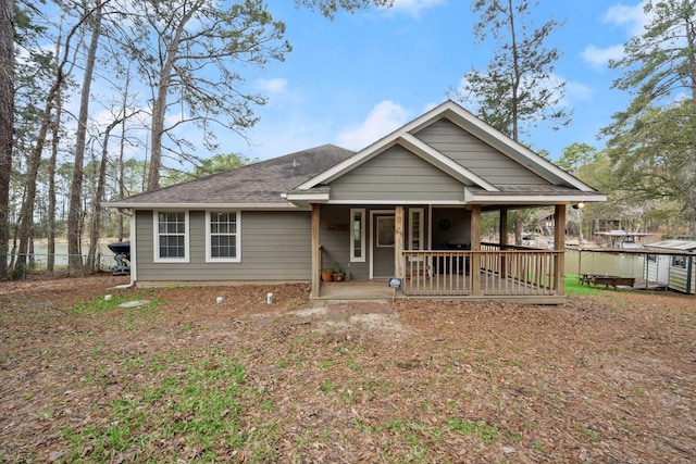 164 Sea Gull Dr, Livingston, TX 77351 - view of front facade with roof with shingles and covered porch