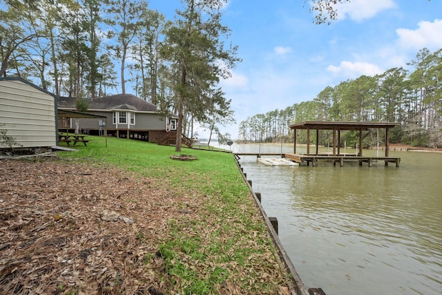 164 Sea Gull Dr, Livingston, TX 77351 - dock area featuring a water view and a lawn