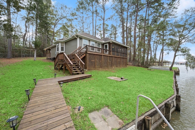 164 Sea Gull Dr, Livingston, TX 77351 - rear view of house featuring stairs, a deck with water view, and a yard