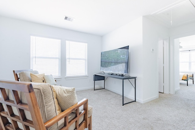 14205 Wonder Lake Ln, Conroe, TX 77384 - carpeted living area with attic access and baseboards