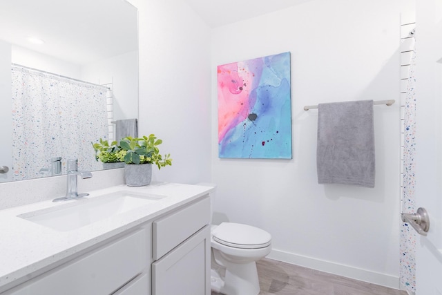 14205 Wonder Lake Ln, Conroe, TX 77384 - full bath with vanity, wood finished floors, and a shower with curtain