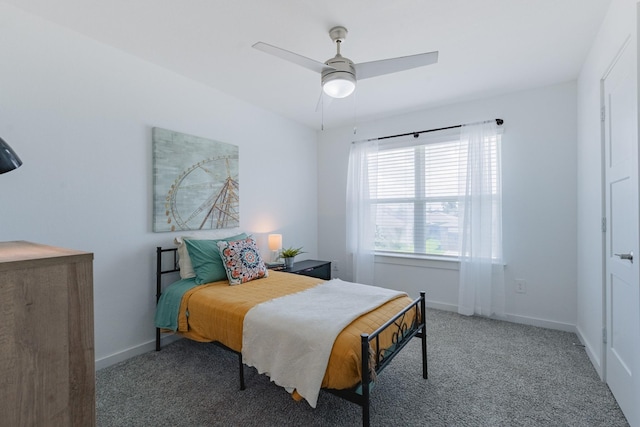 14205 Wonder Lake Ln, Conroe, TX 77384 - carpeted bedroom with baseboards and a ceiling fan