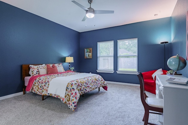 14205 Wonder Lake Ln, Conroe, TX 77384 - carpeted bedroom featuring ceiling fan and baseboards