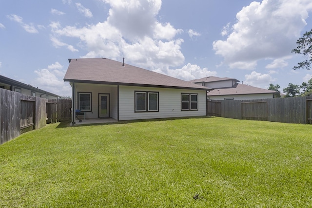 14205 Wonder Lake Ln, Conroe, TX 77384 - back of house featuring a fenced backyard and a patio