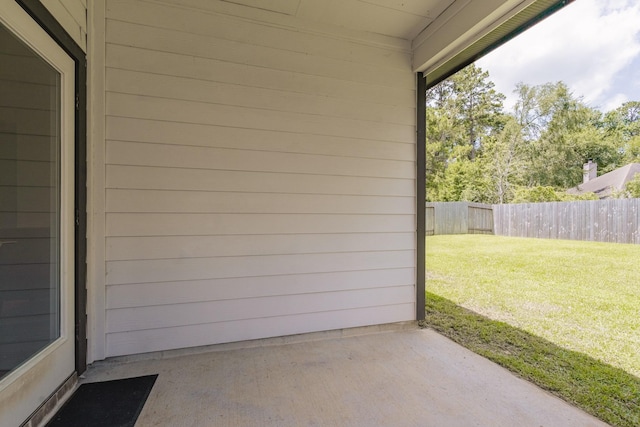14205 Wonder Lake Ln, Conroe, TX 77384 - fenced backyard with a patio