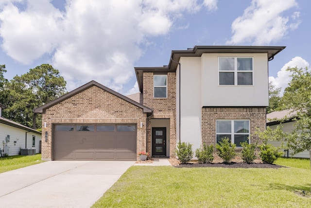 14205 Wonder Lake Ln, Conroe, TX 77384 - view of front of home featuring a garage, driveway, brick siding, and a front lawn