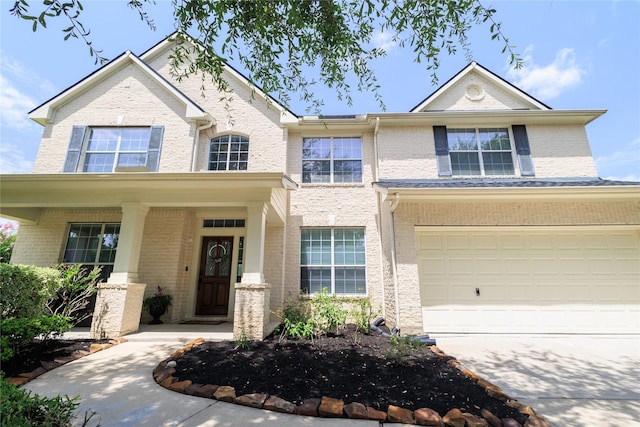 2506 Foxcrest Dr, Katy, TX 77494 - view of front of property featuring brick siding, driveway, and a garage
