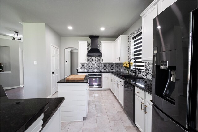 2506 Foxcrest Dr, Katy, TX 77494 - kitchen with fridge with ice dispenser, wall chimney exhaust hood, butcher block countertops, stainless steel oven, and black dishwasher