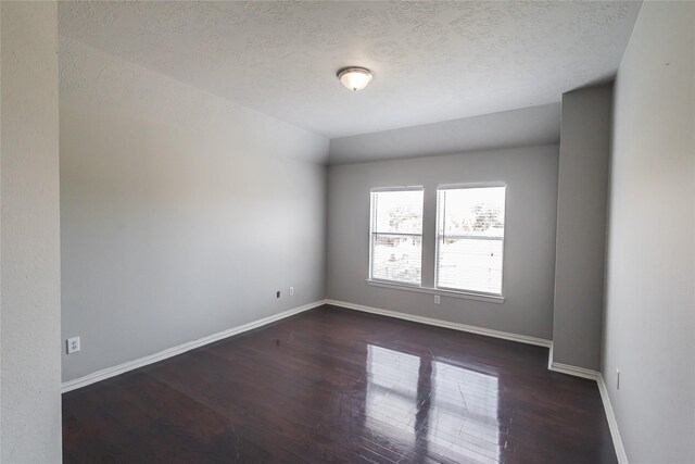 2506 Foxcrest Dr, Katy, TX 77494 - unfurnished room with wood finished floors and a textured ceiling