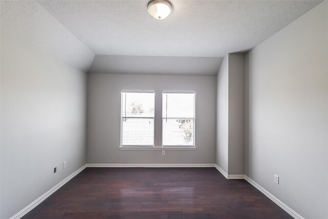 2506 Foxcrest Dr, Katy, TX 77494 - spare room with dark wood-type flooring and a textured ceiling