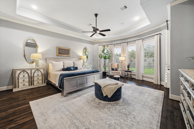 13627 Saddlebred Springs Ln, Cypress, TX 77429 - bedroom featuring a tray ceiling, crown molding, dark wood-type flooring, access to outside, and recessed lighting