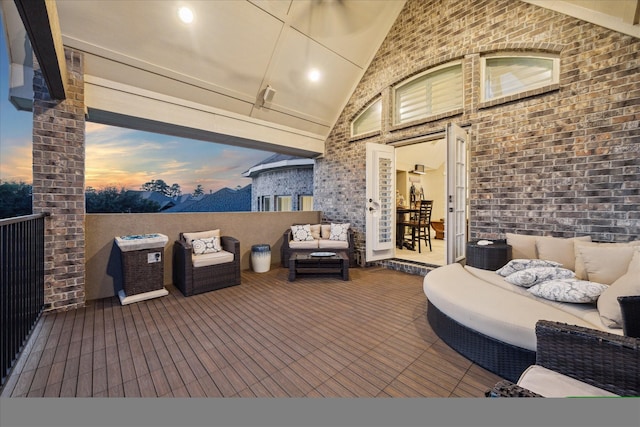 13627 Saddlebred Springs Ln, Cypress, TX 77429 - patio terrace at dusk with an outdoor living space