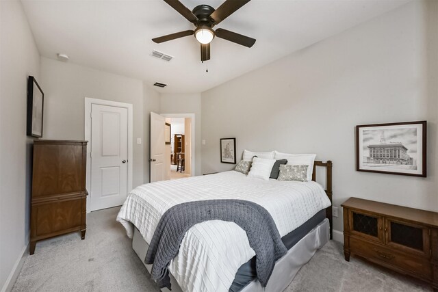 10119 Napier Dr, Iowa Colony, TX 77583 - bedroom with light colored carpet and ceiling fan