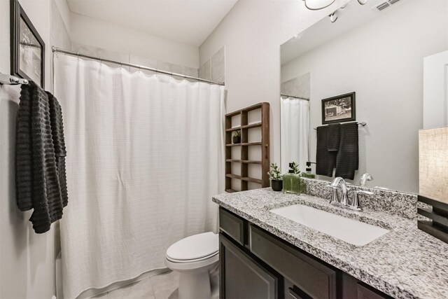 10119 Napier Dr, Iowa Colony, TX 77583 - bathroom featuring vanity and tile patterned floors