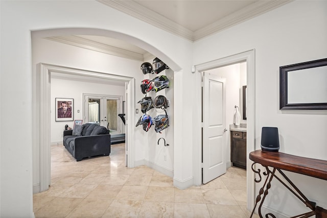 1616 Nevada St, Houston, TX 77006 - hall with crown molding, french doors, arched walkways, and light marble finish flooring