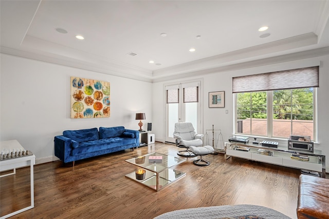 1616 Nevada St, Houston, TX 77006 - living area with a raised ceiling, wood finished floors, crown molding, and recessed lighting