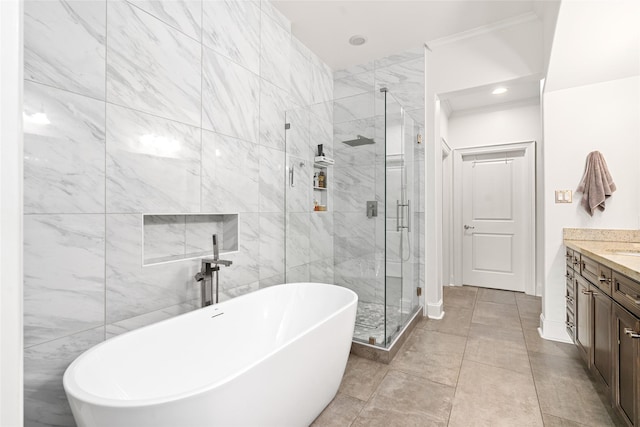 1616 Nevada St, Houston, TX 77006 - full bathroom featuring a freestanding bath, vanity, and a stall shower