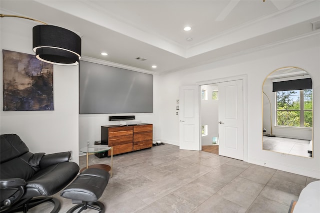 1616 Nevada St, Houston, TX 77006 - living area with crown molding, recessed lighting, and a tray ceiling