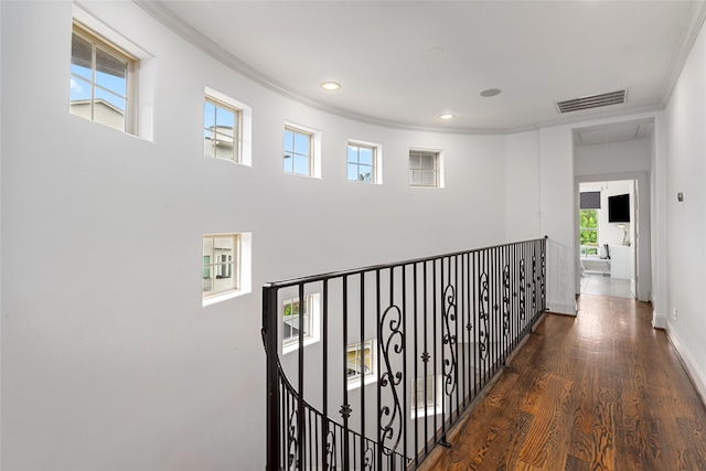 1616 Nevada St, Houston, TX 77006 - hallway with attic access, crown molding, wood finished floors, recessed lighting, and an upstairs landing
