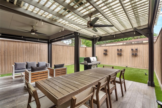 1616 Nevada St, Houston, TX 77006 - fenced backyard featuring a ceiling fan, outdoor dining area, a grill, and a pergola
