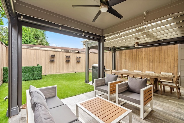 1616 Nevada St, Houston, TX 77006 - fenced backyard featuring ceiling fan, outdoor dining area, an outdoor living space, area for grilling, and a deck