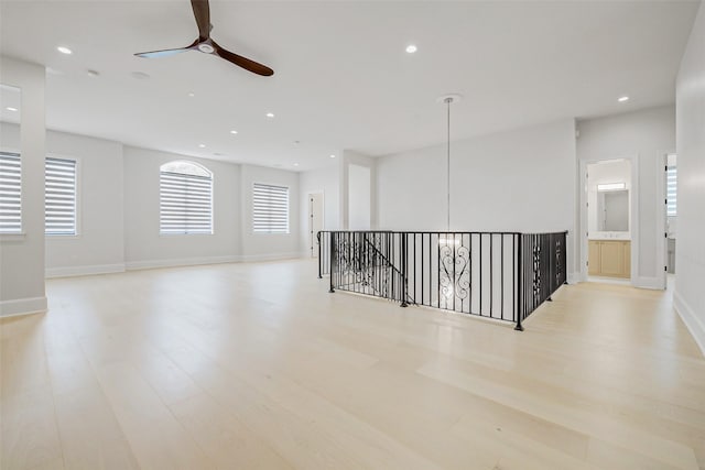 2822 Westgrove Ln, Houston, TX 77027 - empty room featuring ceiling fan, light wood-style flooring, and recessed lighting