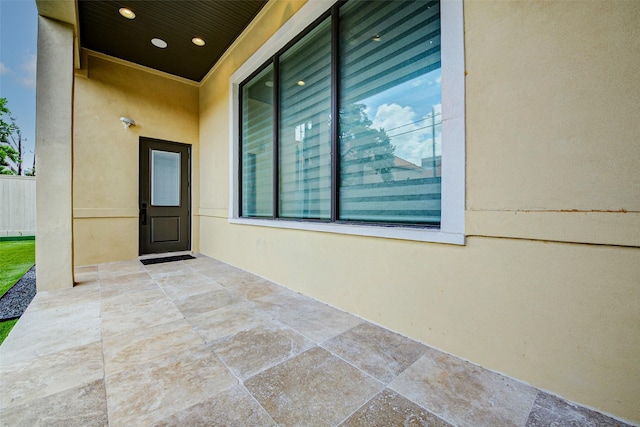 2822 Westgrove Ln, Houston, TX 77027 - doorway to property featuring a patio area and stucco siding