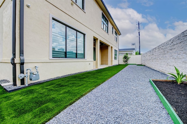2822 Westgrove Ln, Houston, TX 77027 - fenced backyard with a patio