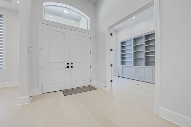 2822 Westgrove Ln, Houston, TX 77027 - foyer entrance with light wood finished floors and recessed lighting