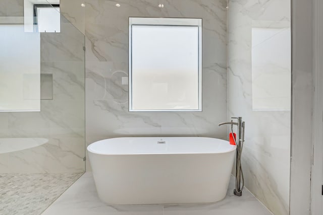 2822 Westgrove Ln, Houston, TX 77027 - full bath with a freestanding tub and marble finish flooring