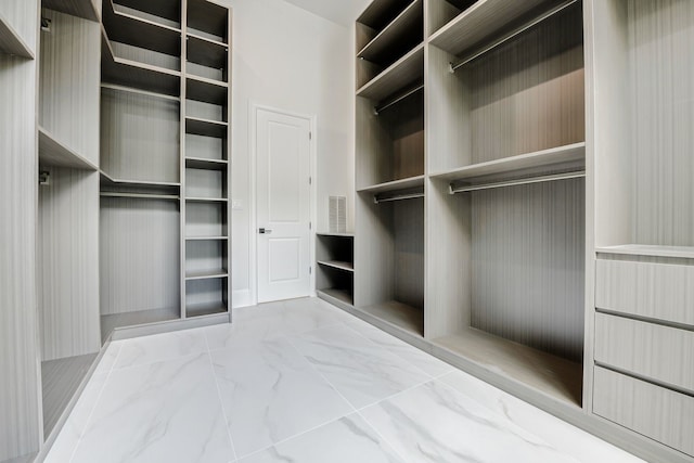 2822 Westgrove Ln, Houston, TX 77027 - spacious closet featuring marble finish flooring