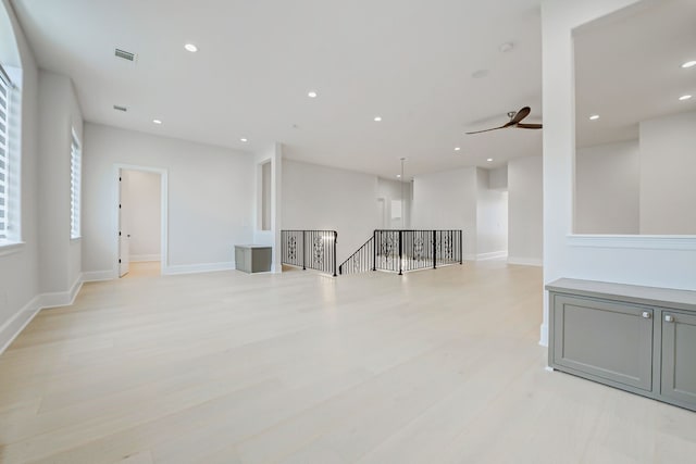 2822 Westgrove Ln, Houston, TX 77027 - spare room featuring light wood finished floors, recessed lighting, and ceiling fan