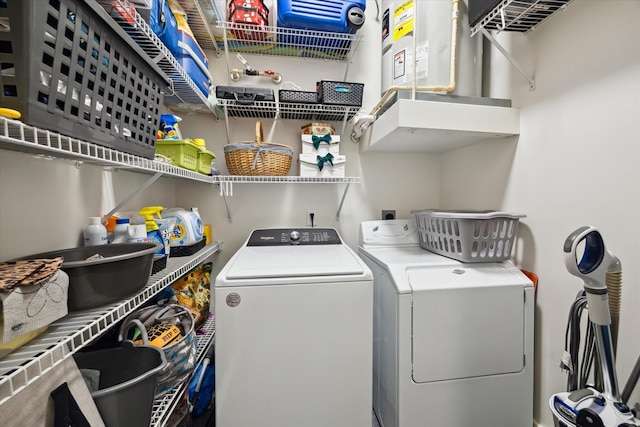 1901 Post Oak Blvd Unit 202, Houston, TX 77056 - laundry area featuring washer and clothes dryer