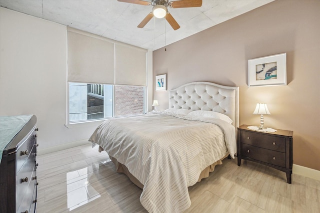 1901 Post Oak Blvd Unit 202, Houston, TX 77056 - bedroom with baseboards and a ceiling fan