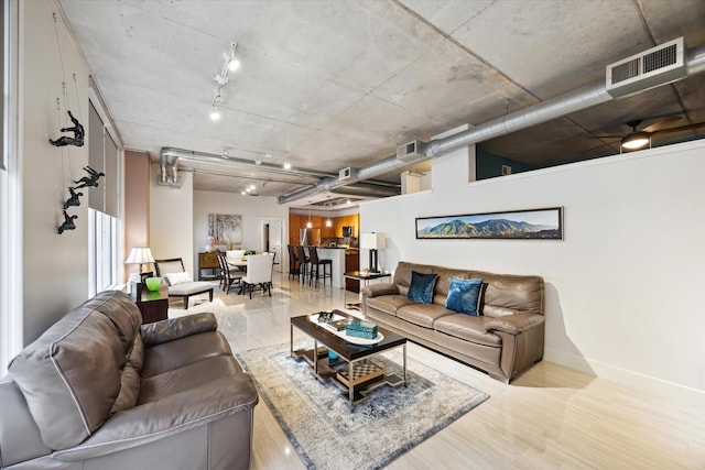 1901 Post Oak Blvd Unit 202, Houston, TX 77056 - living room with wood finished floors and track lighting
