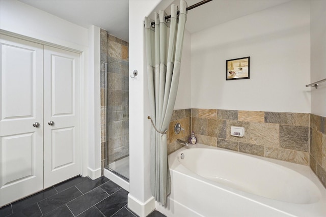 1901 Post Oak Blvd Unit 202, Houston, TX 77056 - full bath with a bath, a shower stall, and tile patterned floors