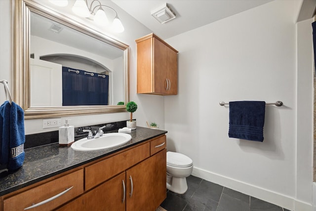 1901 Post Oak Blvd Unit 202, Houston, TX 77056 - bathroom featuring vanity, tile patterned floors, and a shower with shower curtain
