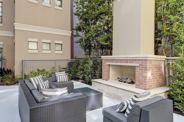 1901 Post Oak Blvd Unit 202, Houston, TX 77056 - view of patio featuring an outdoor living space with a fireplace