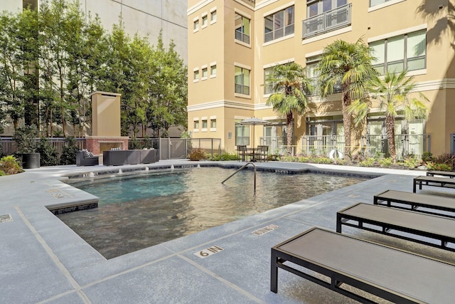 1901 Post Oak Blvd Unit 202, Houston, TX 77056 - community pool with a patio area
