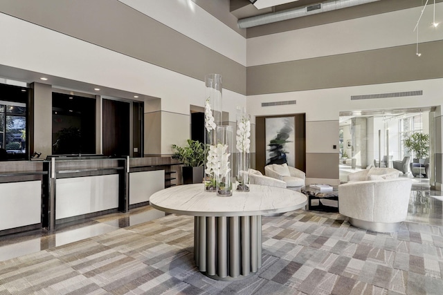 1901 Post Oak Blvd Unit 202, Houston, TX 77056 - dining area with a towering ceiling