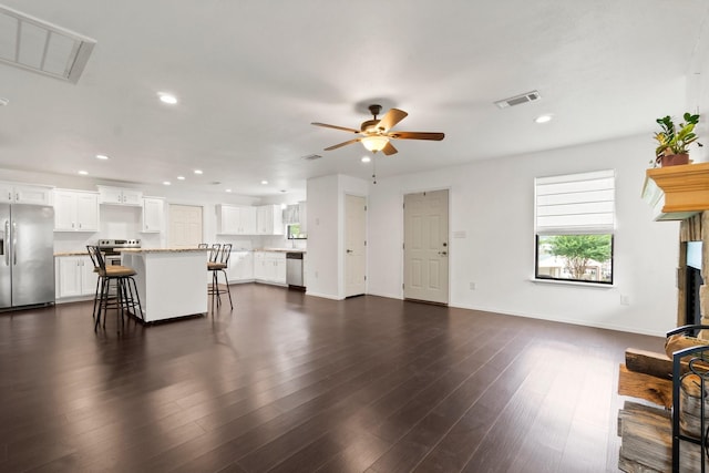 150 Lazy Ln, Livingston, TX 77351 - living room featuring a ceiling fan, recessed lighting, and dark wood-style floors