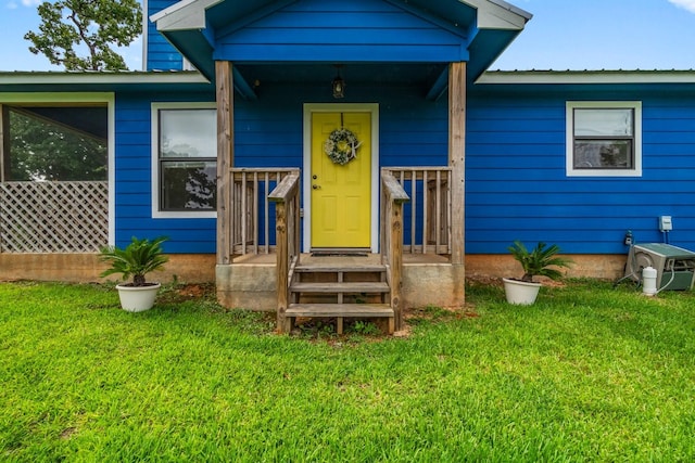 150 Lazy Ln, Livingston, TX 77351 - doorway to property featuring a yard