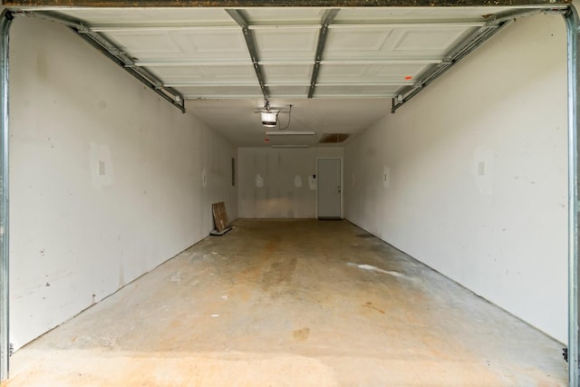 150 Lazy Ln, Livingston, TX 77351 - garage with a garage door opener