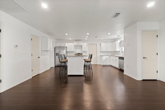 150 Lazy Ln, Livingston, TX 77351 - dining room with recessed lighting and dark wood-type flooring
