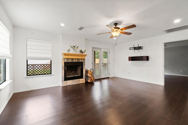 150 Lazy Ln, Livingston, TX 77351 - unfurnished living room featuring a fireplace, a ceiling fan, dark wood-type flooring, and recessed lighting